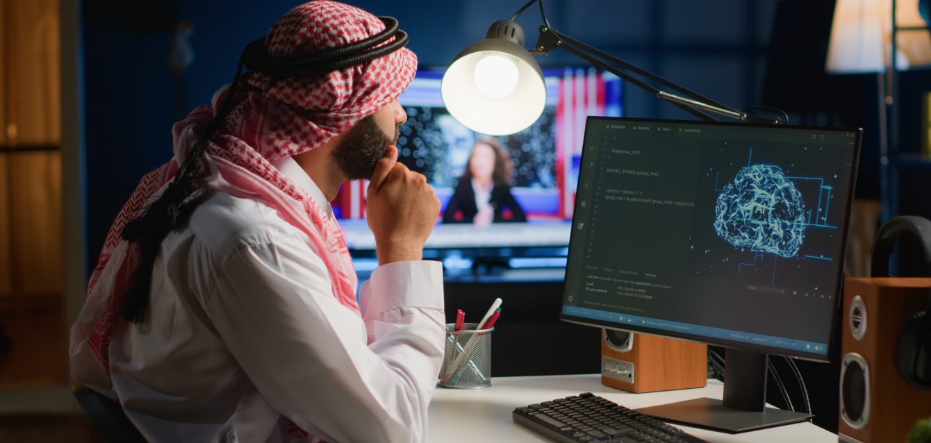 Computer operator updating AI code