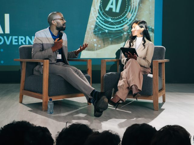 event-presentation-and-people-with-mic-at-stage-f-2026-01-09-09-40-20-utc