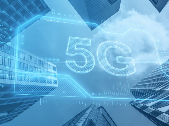 blue-5g-chip-on-abstract-bottom-up-view-city-backg-2026-01-11-08-39-56-utc