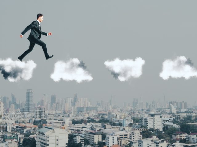 businessman-walking-on-clouds-on-city-background-2026-01-11-08-31-56-utc