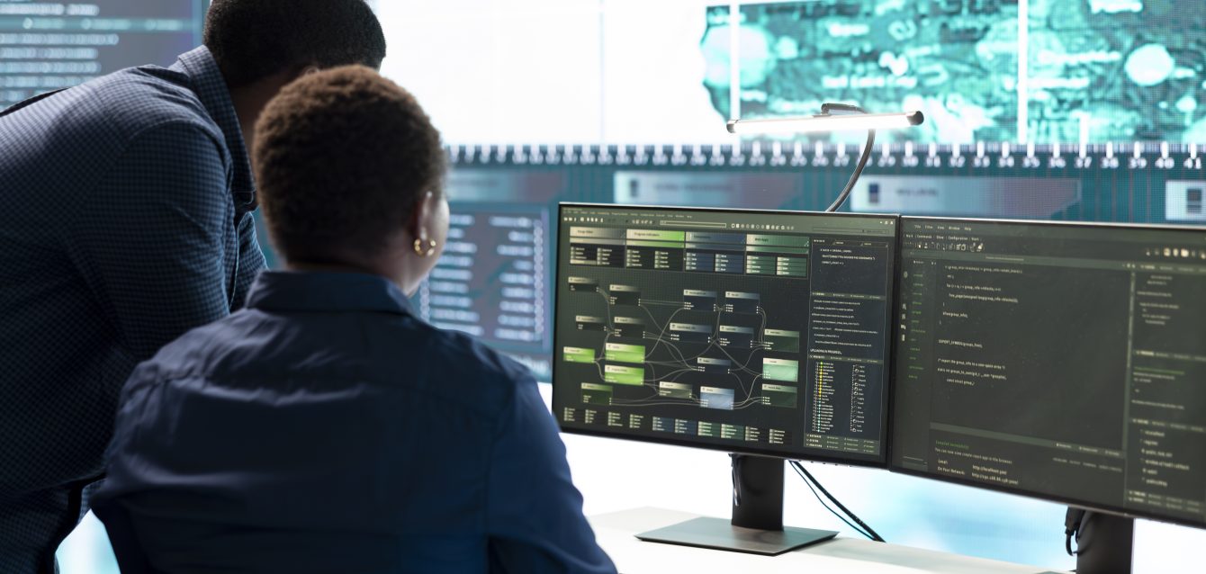 Cyber investigation team working in a governmental hacking room