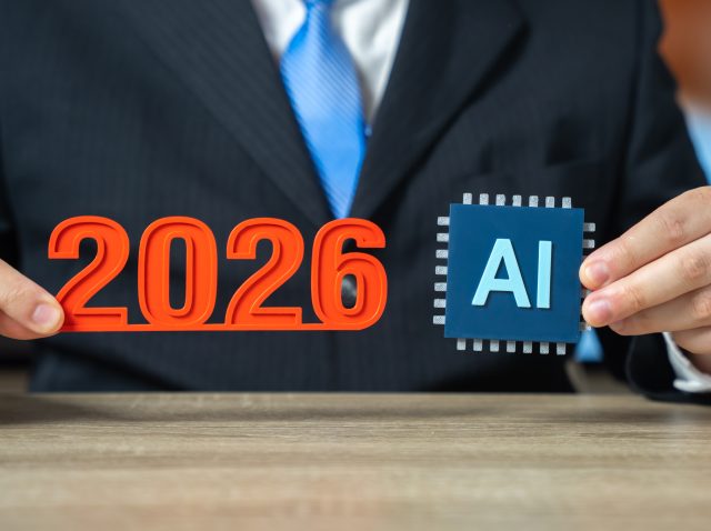 The year 2026 and an AI chip in the hands of a businessman. A year of revolutionary changes