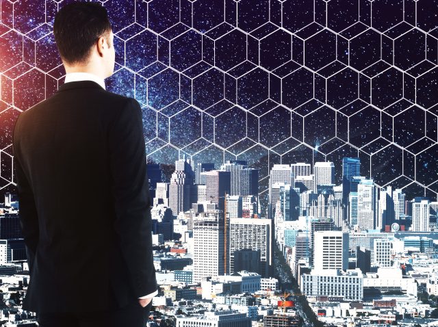 businessman-looking-at-abstract-space-hexagonal-ci-2026-01-11-08-49-03-utc