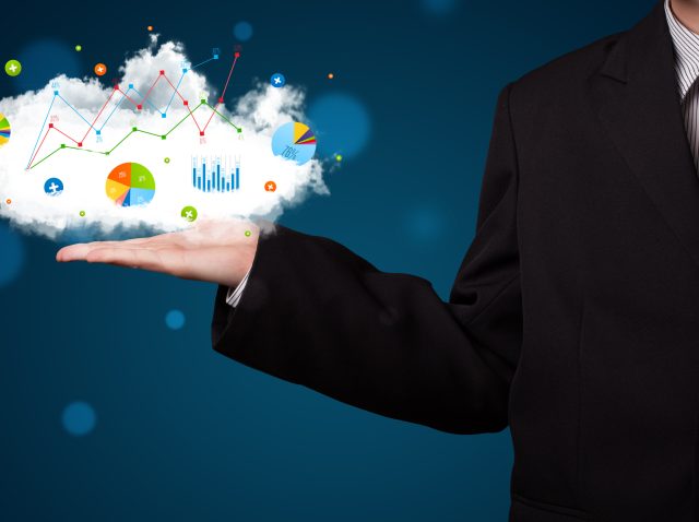 young-businessman-presenting-cloud-with-charts-and-2026-01-09-14-42-26-utc