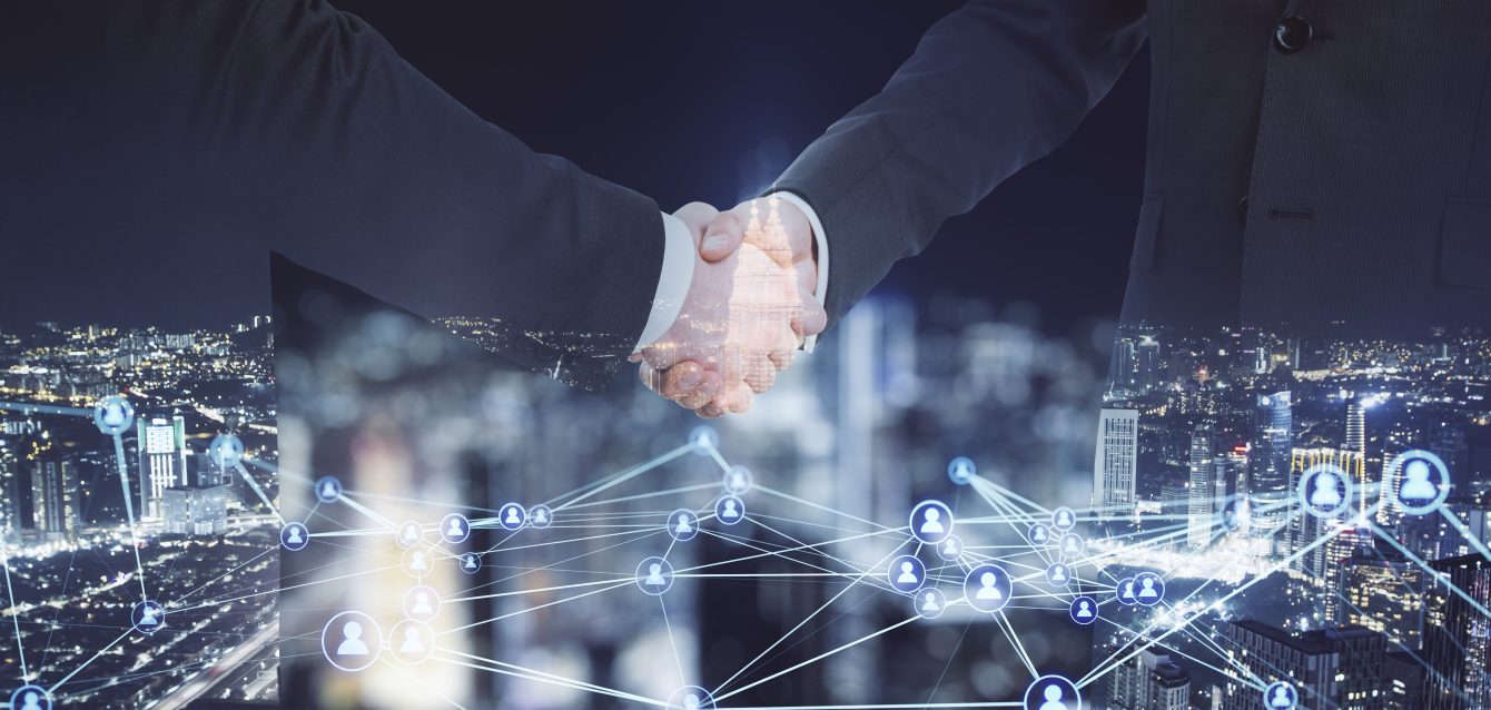 abstract-image-of-men-shaking-hands-on-blurry-glow-2026-01-11-08-46-38-utc