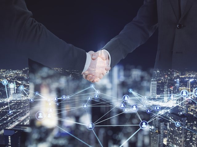 abstract-image-of-men-shaking-hands-on-blurry-glow-2026-01-11-08-46-38-utc abstract-image-of-men-shaking-hands-on-blurry-glow-2026-01-11-08-46-38-utc