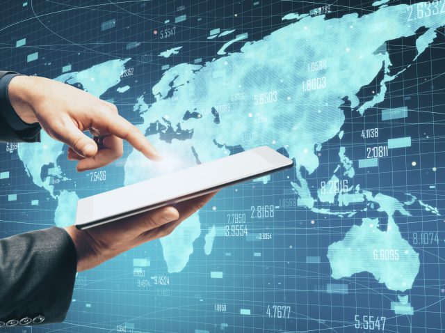 businessman-hand-holding-tablet-with-abstract-glob-2026-01-11-08-41-29-utc