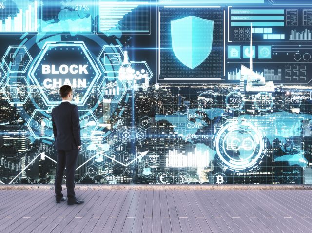 businessman-looking-at-abstract-glowing-business-i-2026-01-11-08-31-49-utc