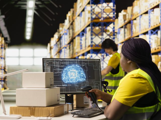 Young woman scanning barcodes with AI automation systems