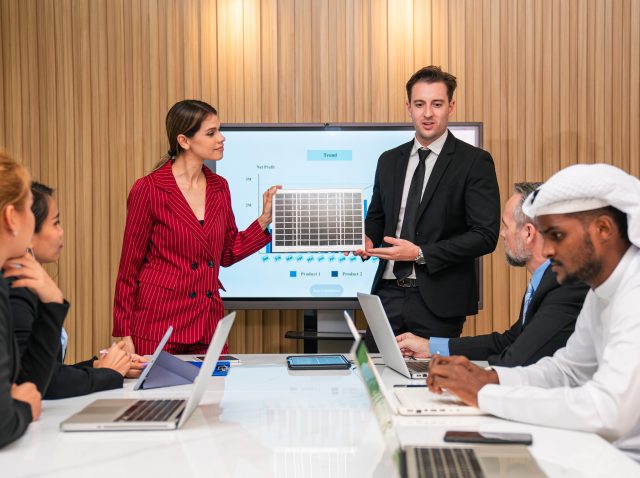 Business person meeting on solar cell panel technology.