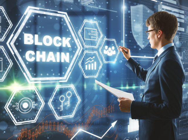 businessman-drawing-abstract-block-chain-hologram-2026-01-11-08-33-49-utc businessman-drawing-abstract-block-chain-hologram-2026-01-11-08-33-49-utc