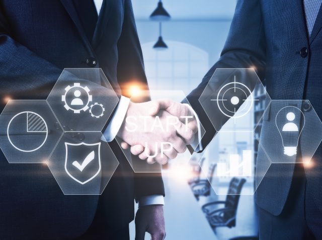 handshake-with-abstract-business-projection-teamw-2026-01-11-08-46-49-utc handshake-with-abstract-business-projection-teamw-2026-01-11-08-46-49-utc