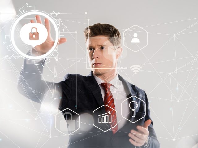 handsome businessman in suit pointing with hands at internet security illustration in front handsome businessman in suit pointing with hands at internet security illustration in front