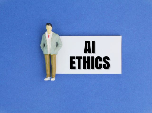 miniature-people-and-paper-with-the-word-ai-ethics-2026-01-08-06-20-41-utc
