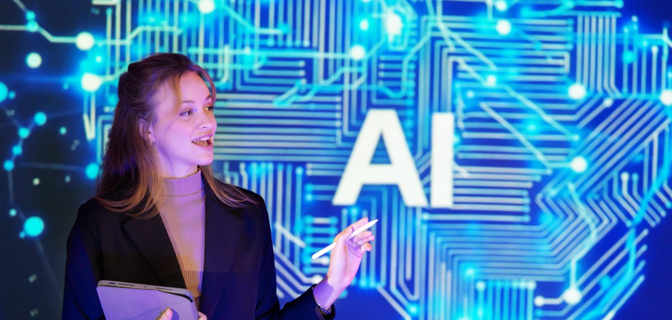 Speaker presents artificial intelligence AI concepts at a techno